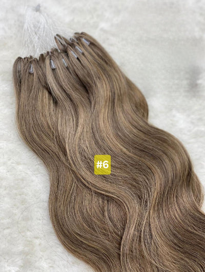 wavy micro loop hair extensions blonde