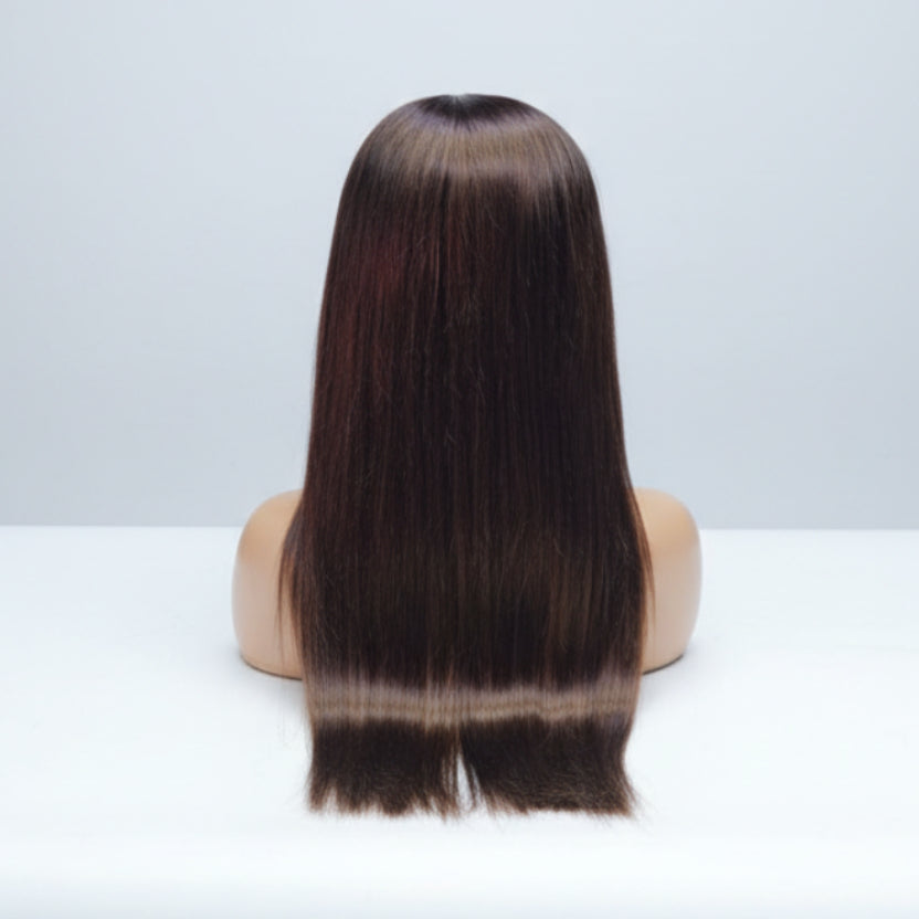 Back view of sleek bone straight dark brown human hair wig showing thick, full ends.