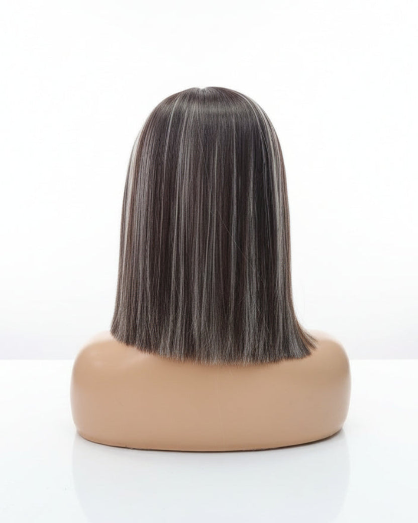 Back view of straight brown bob wig with blonde highlights