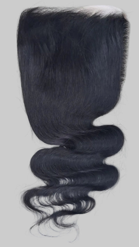 5x5 Wavy Closure. 5x5 lace closure human hair. 
5x5 HD human hair closure for seamless wig installation. 
Close-up of premium 5x5 closure with HD lace.