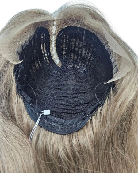 Inside cap view of glueless ash brown middle part human hair wig with adjustable straps and secure combs