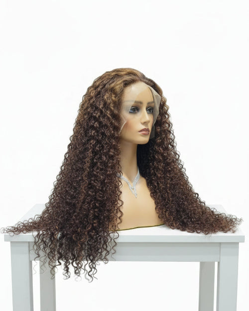 Model wearing a high-density 100% human hair highlight ombre curly lace front wig in Dubai
