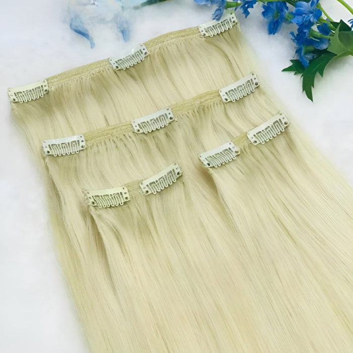 4 piece best blonde clip in hair extensions set made with raw Vietnamese hair showing seamless clip ins