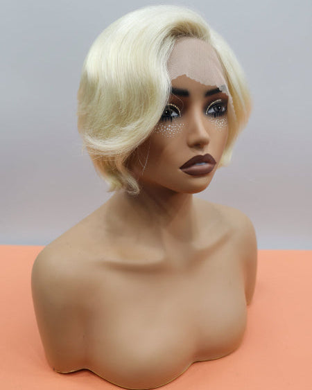 Blonde Pixie Cut Wig. 
blonde glueless pixie wig. 
vintage blonde wave wig. 
Blonde pixie cut wig front view showing finger wave styling. 
Short blonde human hair wig in 613 platinum on mannequin. 