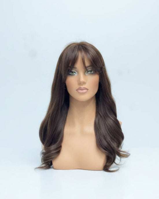 Secure fit of a Glueless Human Hair Wig with Bangs cap construction.