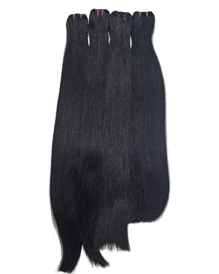 Close-up texture of silky smooth bone straight human hair weft extensions