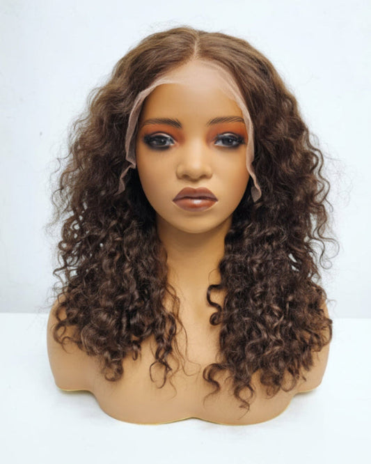 Brown curly wig human hair on mannequin showing pre plucked hd lace front in Dubai