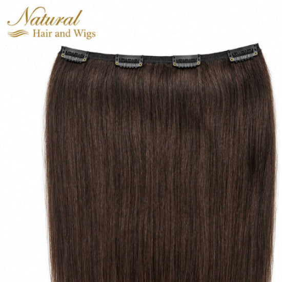Brown Clip in Extensions styled with long flowing hair.