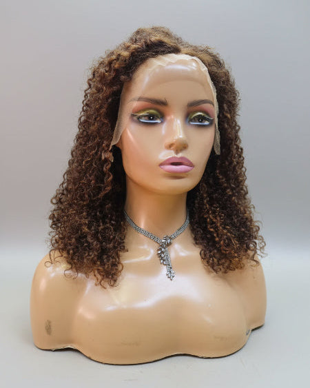 Chocolate Brown Kinky Curly Wig. 
Natural Looking Kinky Curly Wig. 
Kinky Curly Highlight Human Hair Wig. 
Highlight Kinky Curly Human Hair Wig. 
Defined curls on chocolate brown kinky curly human hair wig close up. 