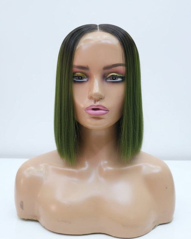Front view of a dark green bob wig with dark roots on a mannequin stand.
