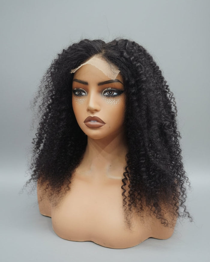 Detailed texture view of virgin human hair kinky curly wig showing defined curls