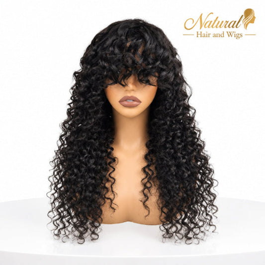 Long curly bang wig with voluminous human hair curls.