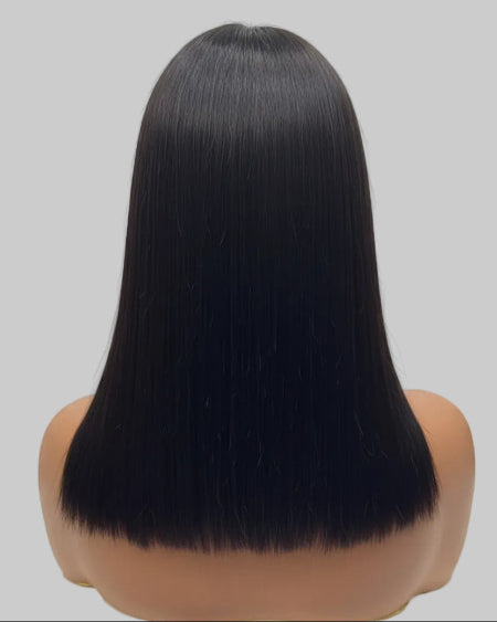 Human Hair Bob Wig Dubai middle part style. 