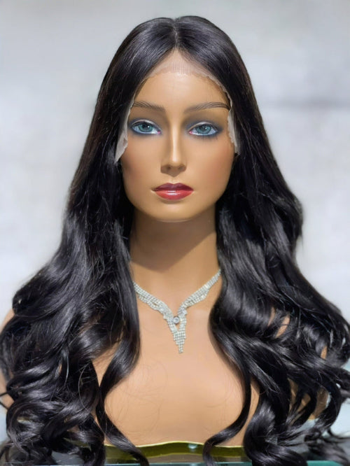 HD lace detail of a Wavy T Part Color Wig showing natural scalp parting and realistic pre-plucked hairline.
