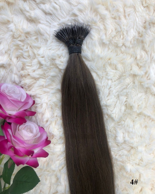 Nano ring hair extensions available in Dubai with gold thread bundle.