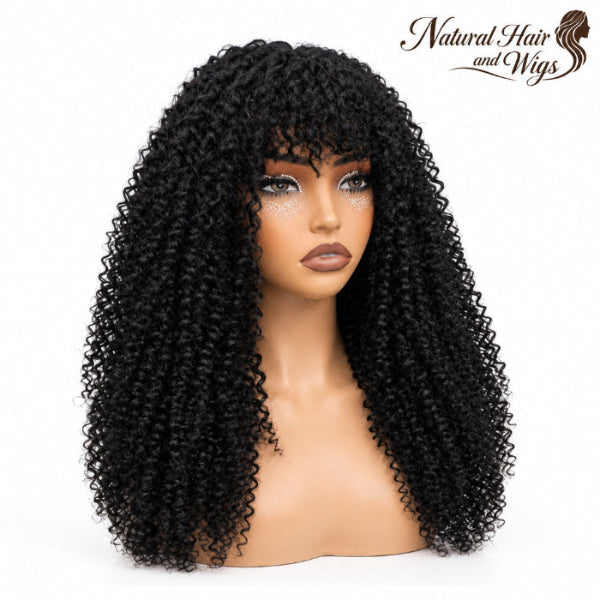 Side angle of kinky curly human hair wig with bangs displaying full density and curls.
