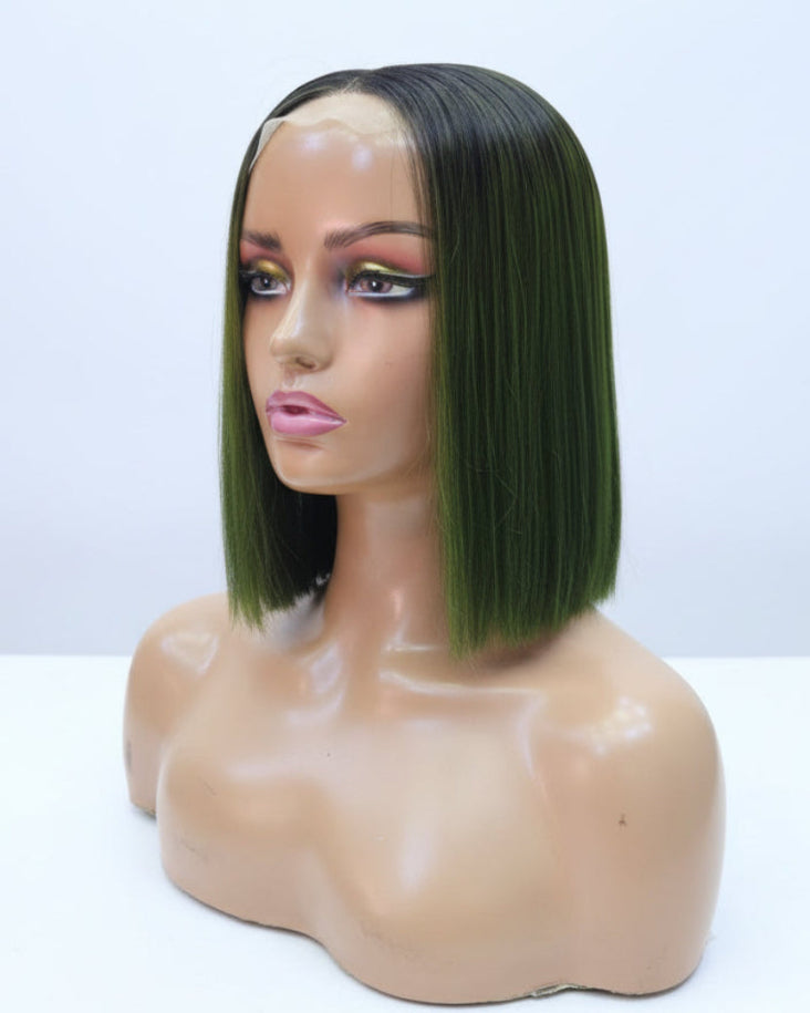Top view of a 1b green bob wig showing the natural HD lace parting space.