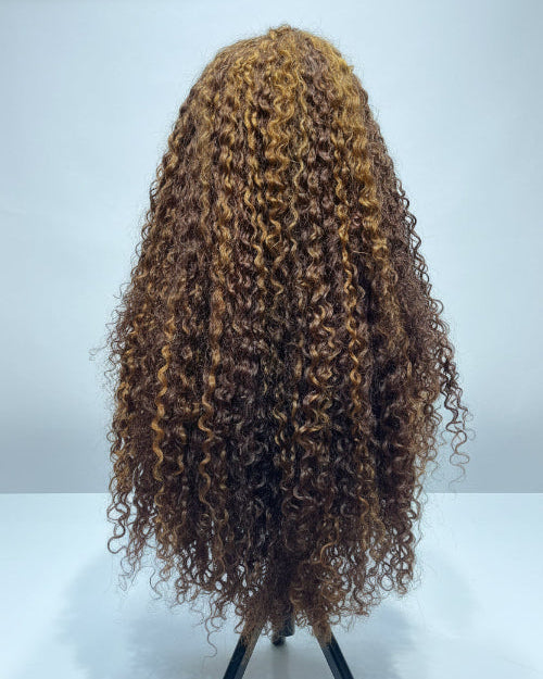 Interior view of adjustable straps and combs inside a glueless curly ombre lace front wig cap
