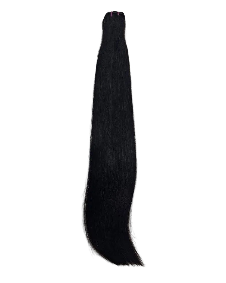 Customer showcasing silky, full-density bone straight human hair extensions in Dubai